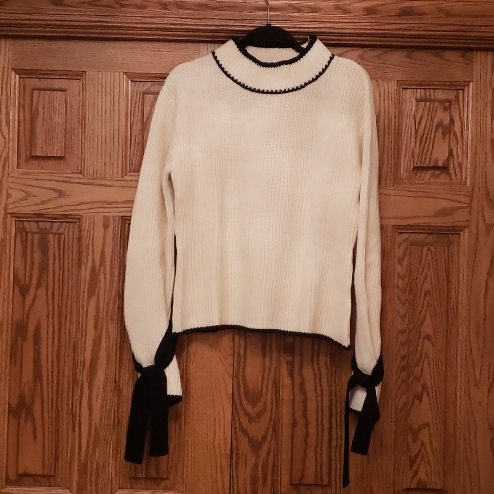 Ivory Sweater with Black Trim